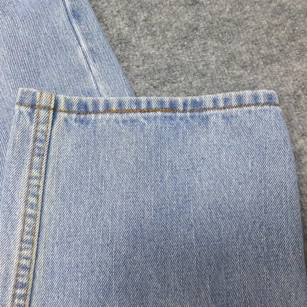 90's Levis 550 Relaxed Fit Jeans Mens 34x34 Light Wash Blue Denim